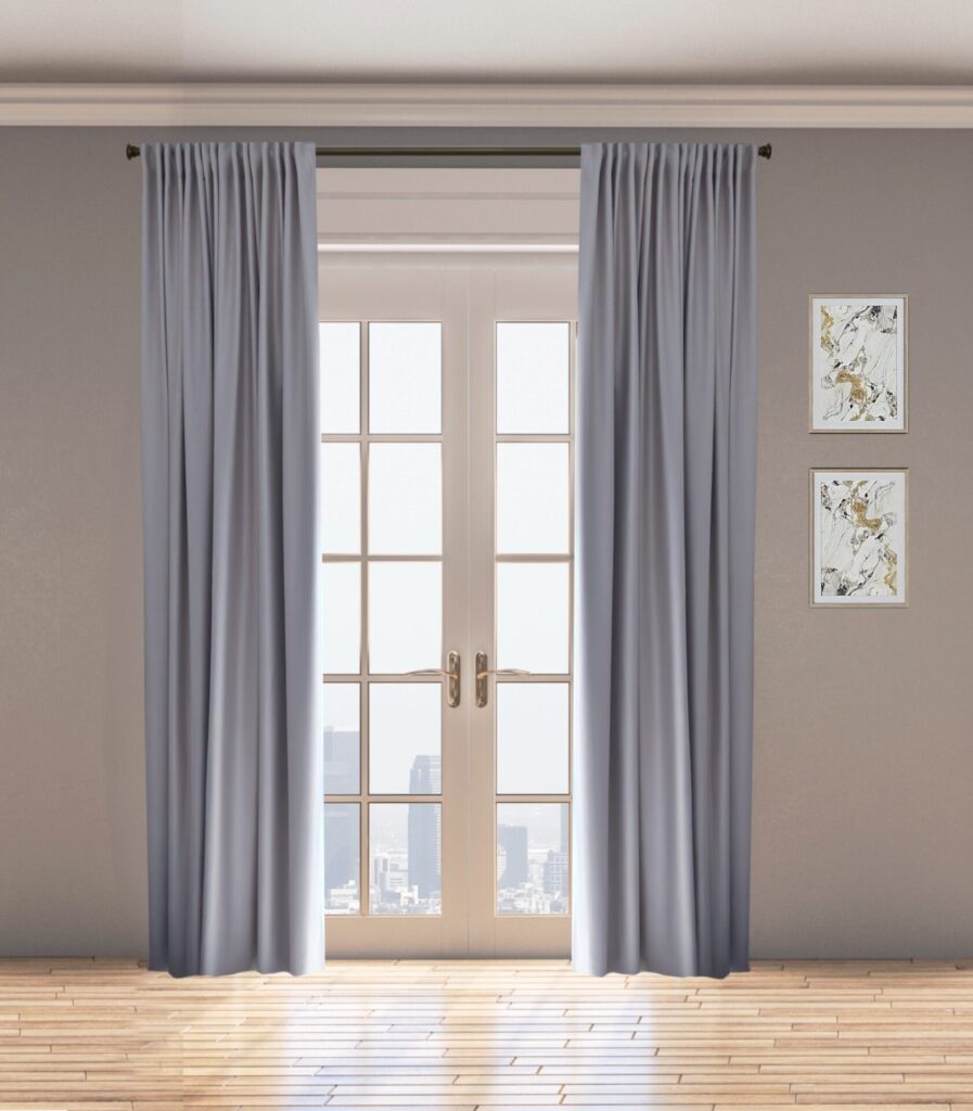 A Pair Of Light Gray Curtains Hangs In Front Of Glass Double Doors. Two Framed Abstract Artworks Adorn The Wall. Sunlight Filters Through The Doors Onto A Wooden Floor.